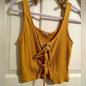 Pre loved heart & hips mustard colored tank top